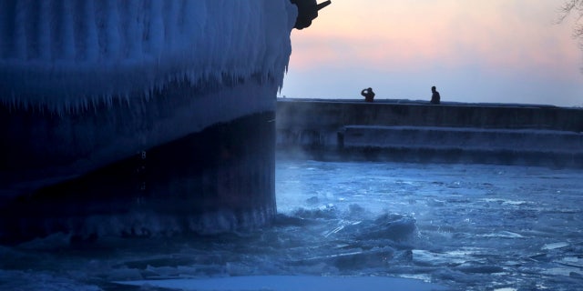 Steam rises from Lake Superior as the ship St. Clair comes to harbor during some of the coldest temperatures of the year.