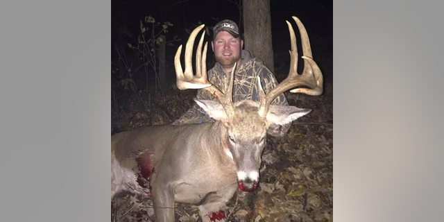 Fluekiger and his 182-inch Wisconsin giant.