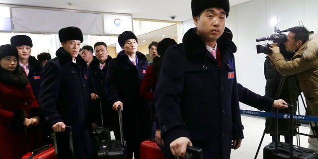Members of North Korea's Taekwondo demonstration team, pictured, are part of the delegation whose Olympic expenses South Korea agreed to pay, according to a report.