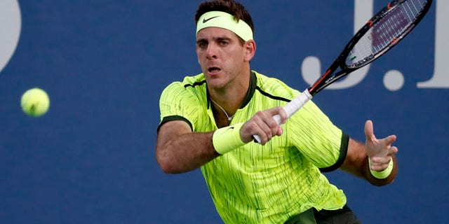 Juan Martin del Potro returns a shot to Diego Schwartzman at the U.S. Open , Tuesday, Aug. 30, 2016, in New York.