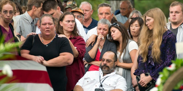 Aug. 29, 2013: With hundreds in attendance, Spokane veteran Delbert Belton is buried with full military honors during a public service at Greenwood Memorial Terrace in Spokane, Wash.