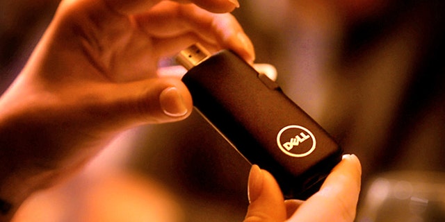 To combat dwindling sales in a post-PC era, Dell will release a new sub $100 thumbstick computer by June, officials say.