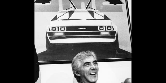 John Z. DeLorean answers reporters' questions at his news conference in New York on Feb. 19, 1982. (AP Photo/Marty Lederhandler)