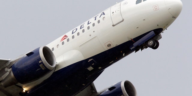 In this file photo taken July 22, 2011 a Delta Air Lines jet takes off at the Detroit Metropolitan Airport in Romulus, Mich. Delta Air Lines on Tuesday, July 22, 2014 canceled all flights to Israel until further notice, citing reports that a rocket landed near Tel Aviv's Ben Gurion Airport.
