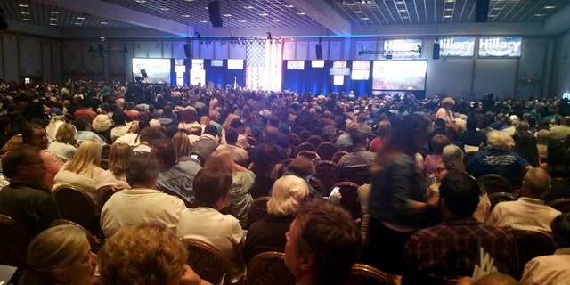 Thousands of people gather at the Paris casino in Las Vegas for the Nevada State Democratic Convention on Saturday, May 14, 2016. They are picking delegates to send to the national convention in July. (AP Photo/Michelle Rindels)