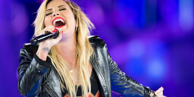 Demi Lovato performs during We Day in Toronto, on Friday Sept. 20, 2013.