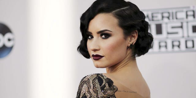 November 22, 2015. Singer Demi Lovato arrives at the 2015 American Music Awards in Los Angeles, California.