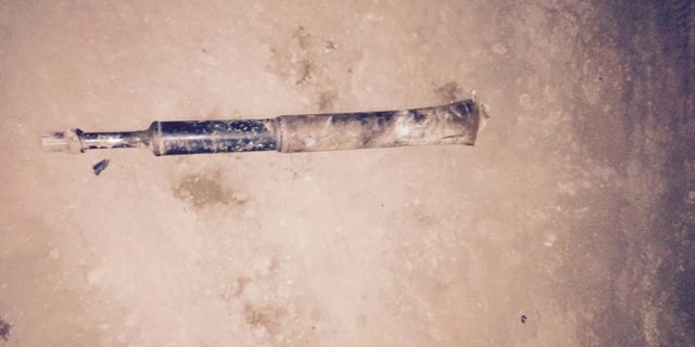 The metal part that broke loose.
