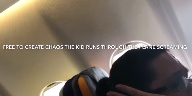 A still from Townley's video shows a passenger covering her ears as the boy runs by screaming.