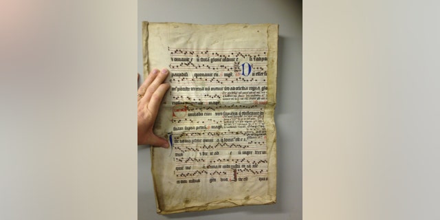 The inside of a book binding from one of the books, which dates back to the 16th century