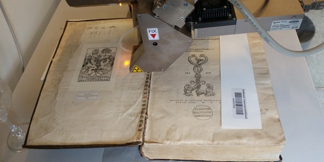 Scientists were looking for fragments of medieval manuscripts used to bind the books when they discovered the arsenic