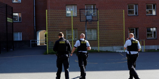 Police patrol the grounds in Mjolnerparken, a housing estate that features on the Danish government's "Ghetto List", in Copenhagen, Denmark, May 2, 2018.