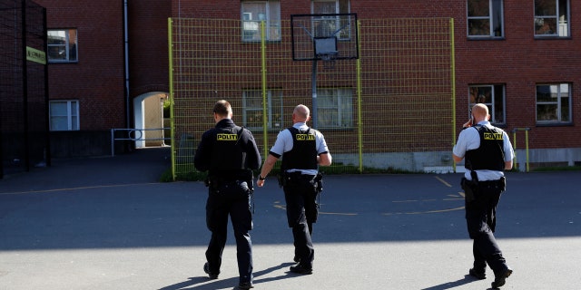 Police patrol the grounds in Mjolnerparken, a housing estate that features on the Danish government's "Ghetto List", in Copenhagen, Denmark, May 2, 2018.