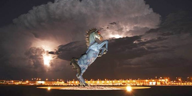 The bright blue Mustang outside the airport by El Paso artist Luis Jiménez actually killed him in 2006.