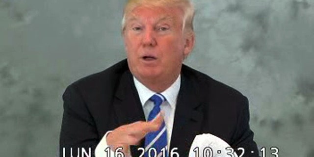 In this image from video provided via CBS News, Donald Trump speaks during a videotaped deposition on June 16, 2016.