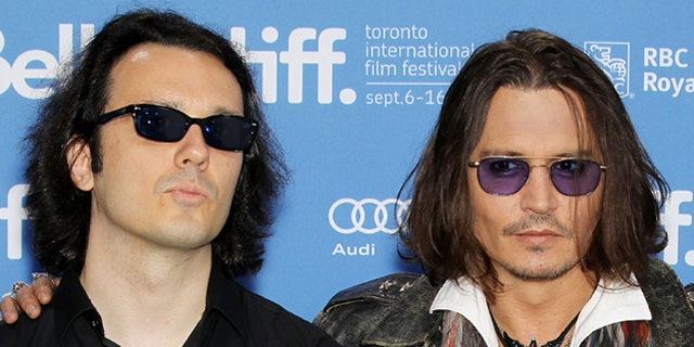 Sept. 8, 2012: Damien Echols, one of the West Memphis Three, and actor Johnny Depp appear at a press conference for "West of Memphis" at the 2012 Toronto International Film Festival. The pair, Echols told FoxNews.com, are "like brothers" and have four matching tattoos. (AP/STARPIX)