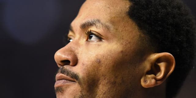 Mar 23, 2016; Chicago, IL, USA; Chicago Bulls guard Derrick Rose (1) looks on during the first half against the New York Knicks at the United Center. Mandatory Credit: Mike DiNovo-USA TODAY Sports