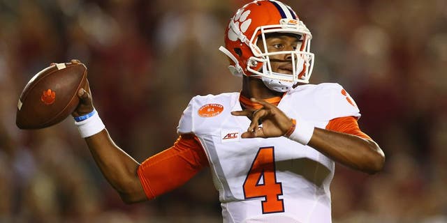TALLAHASSEE, FL - SEPTEMBER 20: Deshaun Watson #4 of the Clemson Tigers throws against the Florida State Seminoles at Doak Campbell Stadium on September 20, 2014 in Tallahassee, Florida. (Photo by Ronald Martinez/Getty Images)