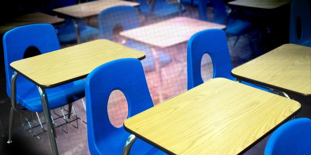 Classroom desks used at Decker College await auction Friday, Feb. 10, 2006 at the site of the former school in Louisville, Ky. Decker, a for-profit trade school run by former Massachusetts Gov. William Weld, is now closed, mired in bankruptcy proceedings and under FBI investigation in a case that has cast a long shadow over Weld's bid to become the next governor of New York. (AP Photo/Brian Bohannon)