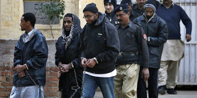 Pakistani police say the five men contacted the Taliban over the Internet and plotted attacks.