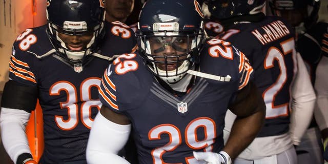 CHICAGO, IL - JANUARY 03: Harold Jones-Quartey #29 of the Chicago Bears runs out with teammates to the field for warm-ups prior to the game against the Detroit Lions at Soldier Field on January 3, 2016 in Chicago, Illinois. (Photo by Kena Krutsinger/Getty Images)