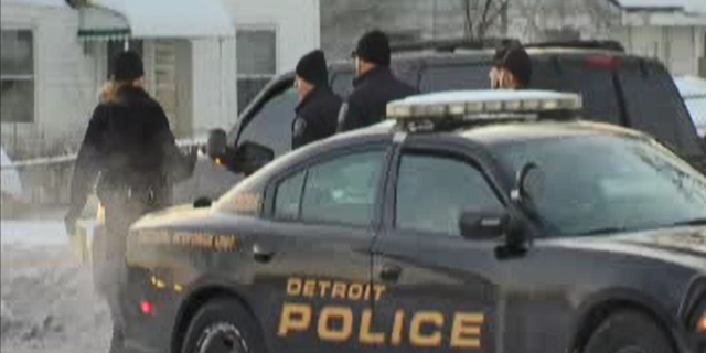 An off-duty Detroit police officer was shot and two women were killed when a barricaded man opened fire, police said.