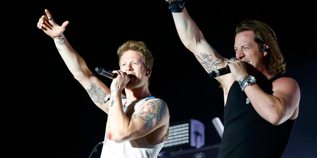 Brian Kelley (L) and Tyler Hubbard of the country pop group Florida Georgia Line made $24 million.