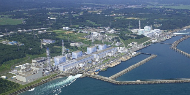 The Fukushima Daiichi Nuclear Power Plant reactors stand in line intact in Okuma town in Fukushima Prefecture, northeastern Japan. Radiation has covered the area around the Fukushima Dai-ichi plant and blanketed parts of the complex, making the job of rendering the plant safe so that it doesn't threaten public health and the environment, or "decommissioning", a bigger task than usual.