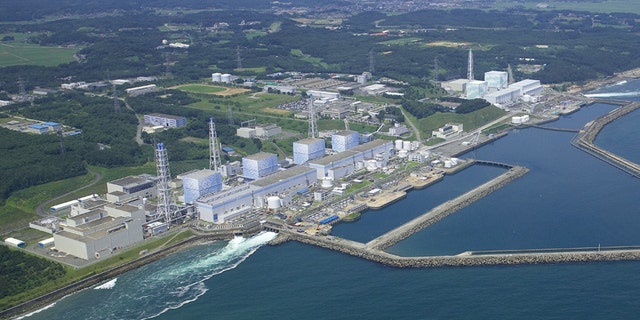 The Fukushima Daiichi Nuclear Power Plant reactors stand in line intact in Okuma town in Fukushima Prefecture, northeastern Japan. Radiation has covered the area around the Fukushima Dai-ichi plant and blanketed parts of the complex, making the job of rendering the plant safe so that it doesn't threaten public health and the environment, or "decommissioning", a bigger task than usual.