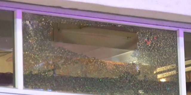 The shootout in the parking lot of a gentlemen's club came after a road rage incident nearby, police said.