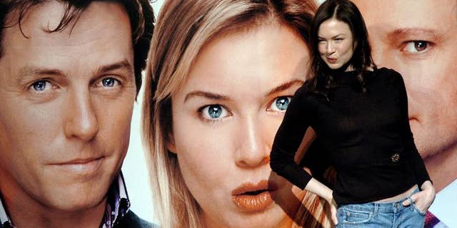 Actress Renee Zellweger poses in front of a poster for filme " Bridget Jones: The Edge of Reason " in Taipei, December 3, 2004
