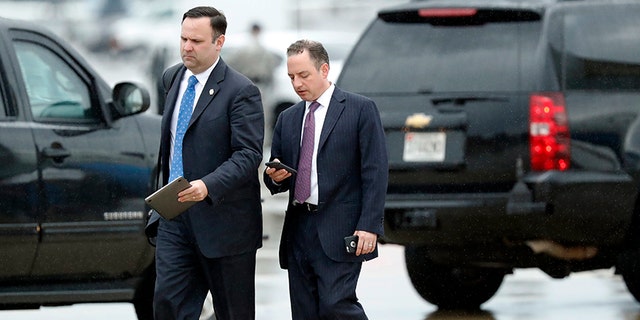 White House Director of Social Media Dan Scavino, left, walks with former White House Chief of Staff Reince Priebus steps off Air Force One as they arrive Friday, July 28, 2017, at Andrews Air Force Base, Md. Trump says Homeland Secretary John Kelly is his new White House chief of staff. (AP Photo/Alex Brandon)
