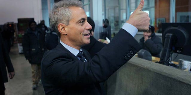CHICAGO, IL - JANUARY 25: Mayoral candidate and former White House Chief of Staff Rahm Emanuel gives teh thumbs up at a produce distribution warehouse where he received the endorsement of Teamsters Joint Council 25 on January 25, 2011 in Chicago, Illinois. According to reports, Emanuel has been placed back on the Chicago Mayoral ballot after the Illinois Supreme Court issued a stay on an Illinois Appellate Court decision that he didn't meet Chicago residency requirements to run for mayor. (Photo by Scott Olson/Getty Images)