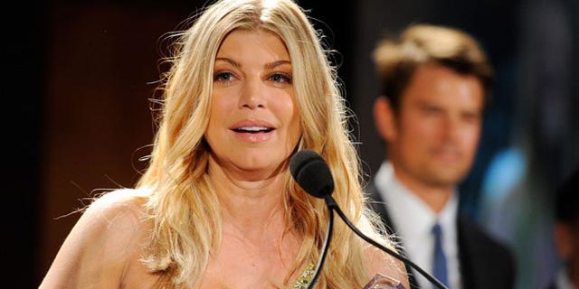 MAY 25: Singer Fergie accepts the FiFi New Celebrity Fragrance of the Year Award.