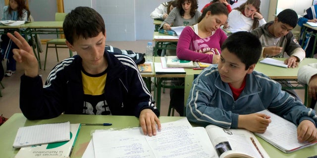 Inmigrants at school. Inmigrant children from several nacionalities in a Madrid school. (Photo by Mariana Silvia Eliano/Cover/Getty Images)
