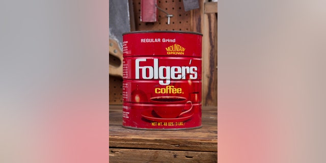 Joliet, IL- July 5, 2014: The coffee can remains a stand presence in the garage work space s a catch all for nails, bolts and miscellaneous items.