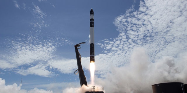 In this photo provided by Rocket Lab, Electron rocket carrying only a small payload of about 150 kilograms (331 pounds), lifts off from the Mahia Peninsula on New Zealand's North Island's east coast. The rocket launched from New Zealand on Sunday successfully reached orbit carrying small commercial satellites. (Rocket Lab via AP)
