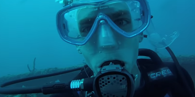 Florida resident Cody Wabiszewski shared a 3-minute video of an unexpected underwater encounter with a great white shark while diving 70 feet below the ocean's surface off the Florida Keys.