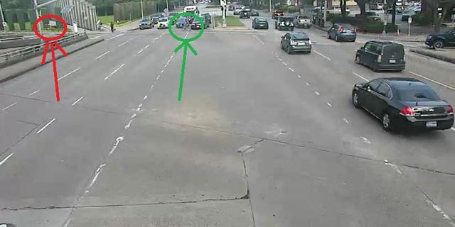 The gunman, circled in red, is seen approaching Hausknecht from behind.