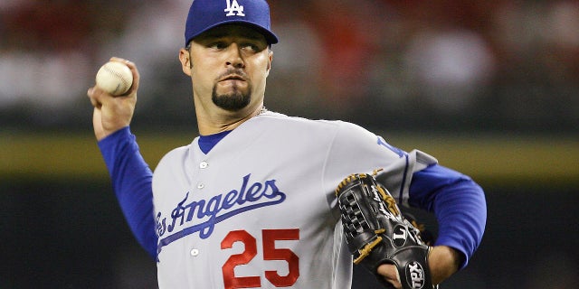 FILE Sept. 21, 2007: Los Angeles Dodgers' Esteban Loaiza, of Mexico, throws a pitch against the Arizona Diamondbacks in the first inning of a baseball game in Phoenix. Former All-Star pitcher Loaiza - who earned a total of more than $43 million over 14 seasons - is heading to court accused of drug dealing involving 20 kilograms (44 pounds) of suspected cocaine. The 46-year-old retired Major League Baseball player is scheduled to appear in court in Chula Vista, Calif., south of San Diego, on Wednesday, Feb. 14, 2018.
