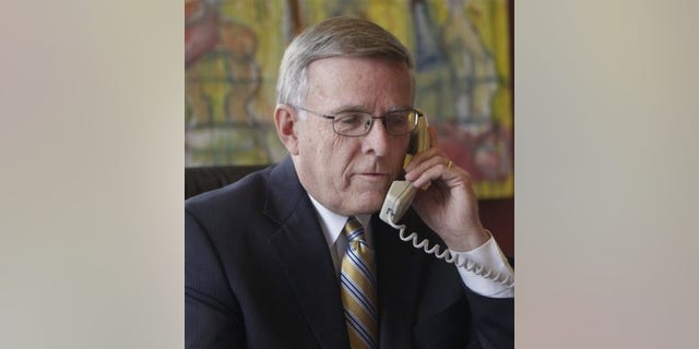 FILE: Sen. Byron Dorgan, D-N.D., talks on the phone in his office on Capitol Hill in Washington on Jan. 6, 2010.