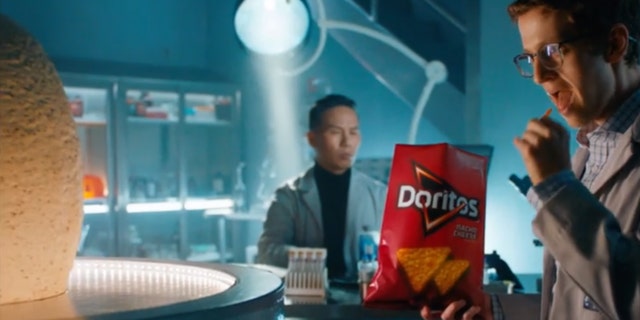 In a special promo video advertising the colossal Doritos, Dr. Henry Wu (played by BD Wong) can be seen in the lab cooking up his latest creation by merging Doritos and dinosaur DNA.