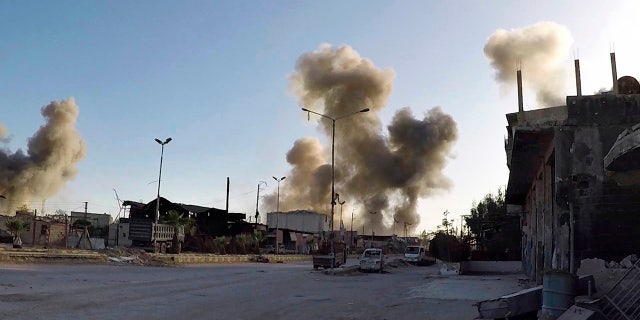 Smoke rises from the site of last week's chemical weapons attack in Douma, Syria.
