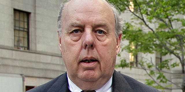 FILE - In this April 29, 20111, file photo, Attorney John Dowd walks in New York. Down, one of the key lawyers in President Donald Trumpâs corner navigated a popular United States senator through crisis, produced a damning investigative report that drove a baseball star from the game and, early in his career, took on organized crime as a Justice Department prosecutor. Dowd assumed a more prominent place on the legal team after another lawyer, Marc Kasowitz, took a reduced role. (AP Photo/Richard Drew, File)