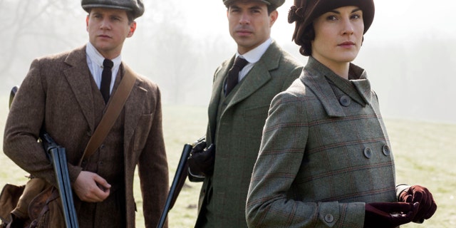 From left, Allen Leech as Tom Branson, Tom Cullen as Lord Gillingham, and Michelle Dockery as Lady Mary, in a scene from season 5 of "Downton Abbey."