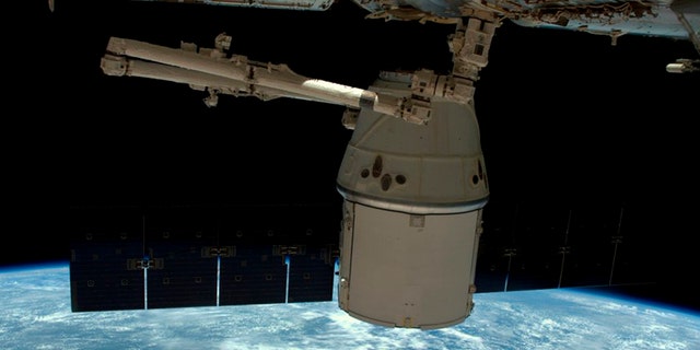 A NASA photo shows a SpaceX Dragon capsule as it is released from the International Space Station in this image released to social media on May 11, 2016. (NASA)
