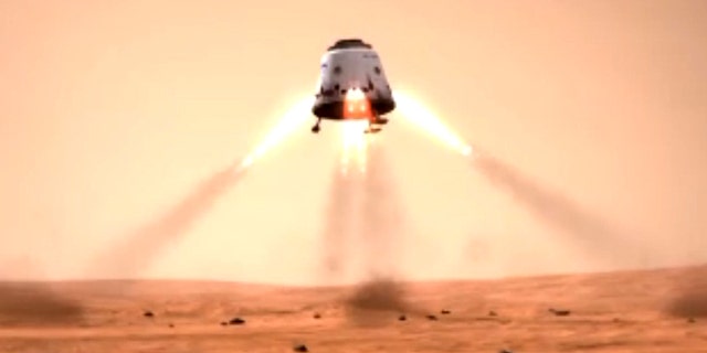 This still from a SpaceX mission concept video shows a Dragon space capsule landing on the surface of Mars. SpaceX's Dragon is a privately built space capsule to carry unmanned payloads, and eventually astronauts, into space.