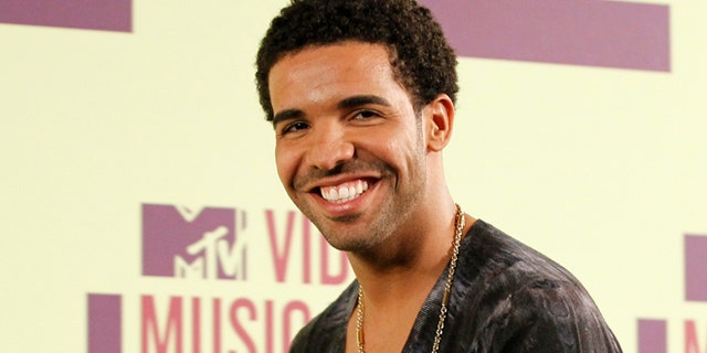 Sept. 6, 2012: Singer Drake holds the award he won for "Best Hip Hop Video" backstage during the 2012 MTV Video Music Awards in Los Angeles.