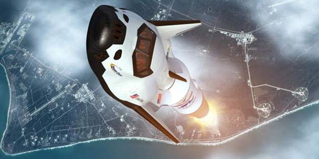 An artistic rendition of the Dream Chaser vehicle launching into space.
