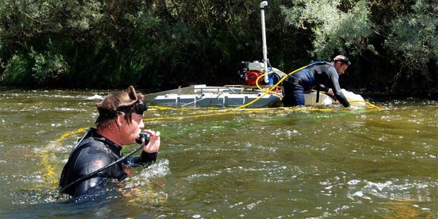 Gold miners say suction dredging is the only effective way of getting gold out of rivers and creeks. (AP)